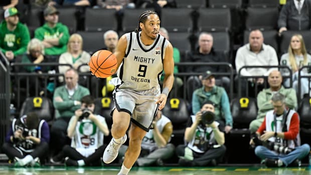 Feb 11, 2025; Eugene, Oregon, USA; Oregon Ducks guard Keeshawn Barthelemy (9) brings the ball up the court during the first h