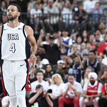 USA guard Steph Curry (4) celebrates scoring on Canada during the first quarter of the USA Basketball Showcase at T-Mobile Arena. 