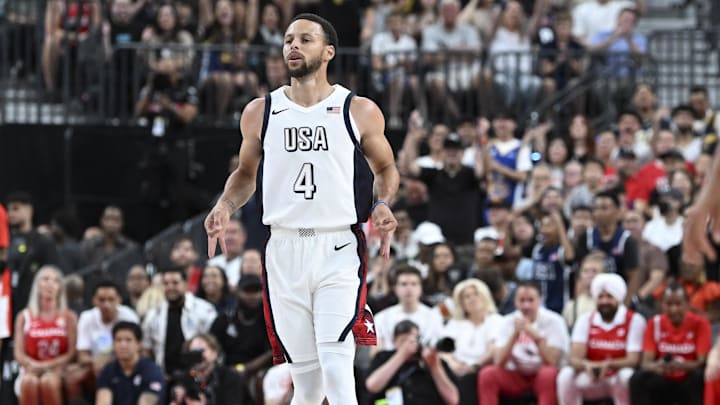 USA guard Steph Curry (4) celebrates scoring on Canada during the first quarter of the USA Basketball Showcase at T-Mobile Arena. USA guard Steph Curry (4) celebrates scoring on Canada during the first quarter of the USA Basketball Showcase at T-Mobile Arena.
