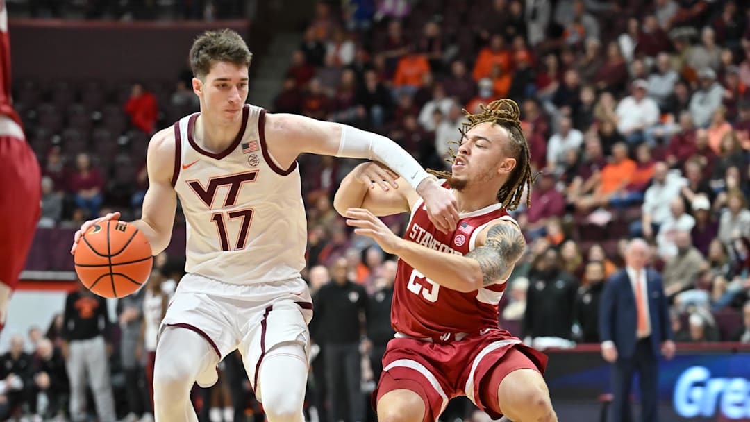 Jan 7, 2026; Blacksburg, Va.; Virginia Tech guard Neoklis Avdalas (17) drives with the basketball defended by Stanford guard Jeremy Dent-Smith (25).