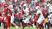 Oct 18, 2025; Fayetteville, Arkansas, USA; Texas A&M Aggies quarterback Marcel Reed (10) celebrates after scoring a touchdown in the second quarter against the Arkansas Razorbacks at Donald W. Reynolds Razorback Stadium. Mandatory Credit: Nelson Chenault-Imagn Images