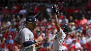 Jul 12, 2025; St. Louis, Missouri, USA;  Atlanta Braves relief pitcher Raisel Iglesias (26) reacts after the Braves defeated the St. Louis Cardinals at Busch Stadium. Mandatory Credit: Jeff Curry-Imagn Images