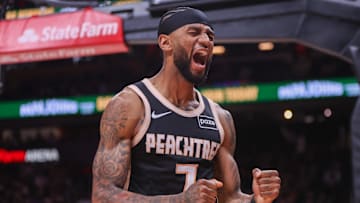 Nov 18, 2025; Atlanta, Georgia, USA; Atlanta Hawks guard Nickeil Alexander-Walker (7) reacts after a basket against the Detroit Pistons in the fourth quarter at State Farm Arena. Mandatory Credit: Brett Davis-Imagn Images