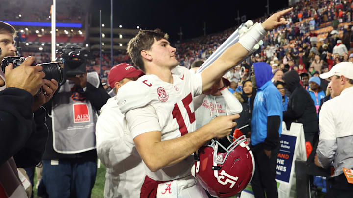 Nov 29, 2025; Auburn, Alabama, USA; Alabama Crimson Tide quarterback Ty Simpson (15) reacts after the game against the Auburn Tigers at Jordan-Hare Stadium. Mandatory Credit: John Reed-Imagn Images