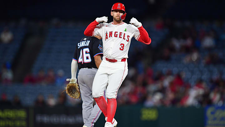 May 24, 2025; Anaheim, California, USA; Los Angeles Angels left fielder Taylor Ward (3) reaches second on a ground rule double against the Miami Marlins during the ninth inning at Angel Stadium. Mandatory Credit: Gary A. Vasquez-Imagn Images