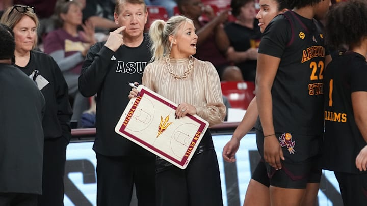 ASU Sun Devils head coach Molly Miller talks to her team on the sidelines as they play the Kansas State Wildcats at Desert Financial Arena in Tempe on Feb. 1, 2026.