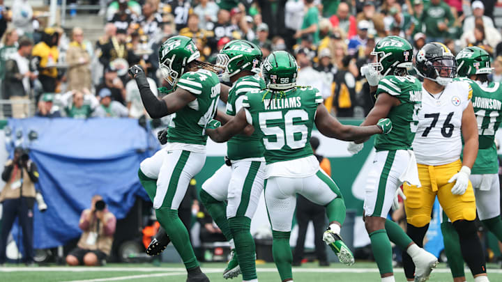 Sep 7, 2025; East Rutherford, New Jersey, USA; New York Jets linebacker Quincy Williams (56) celebrates after a play during the second half against the Pittsburgh Steelers during at MetLife Stadium. Mandatory Credit: Vincent Carchietta-Imagn Images