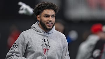 Dec 22, 2024; Atlanta, Georgia, USA; Atlanta Falcons wide receiver Drake London (5) warms up on the field prior to the game against the New York Giants at Mercedes-Benz Stadium. Mandatory Credit: Dale Zanine-Imagn Images