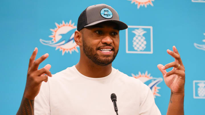 Jul 28, 2024; Miami Gardens, FL, USA; Miami Dolphins quarterback Tua Tagovailoa (1) talks to reporters during a press conference after training camp at Baptist Health Training Complex. 