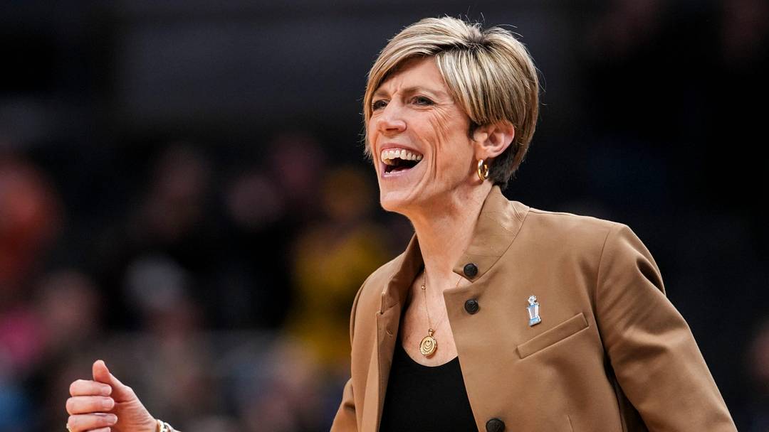 Iowa Hawkeyes head coach Jan Jensen celebrates Saturday, March 7, 2026, during a Big Ten women's basketball tournament semifinals game at Gainbridge Fieldhouse in Indianapolis. The Iowa Hawkeyes defeated the Michigan Wolverines, 59-42.