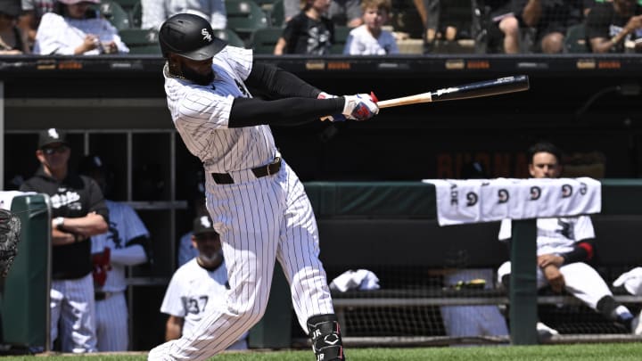 Jul 10, 2024; Chicago, Illinois, USA;  Chicago White Sox outfielder Luis Robert Jr. (88) hits a two-run home run against the Minnesota Twins during the sixth inning at Guaranteed Rate Field. Mandatory Credit: Matt Marton-USA TODAY Sports