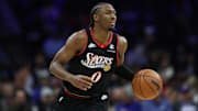 Dec 4, 2025; Philadelphia, Pennsylvania, USA; Philadelphia 76ers guard Tyrese Maxey (0) dribbles the ball against the Golden State Warriors during the first quarter at Xfinity Mobile Arena. Mandatory Credit: Bill Streicher-Imagn Images