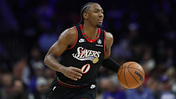 Dec 4, 2025; Philadelphia, Pennsylvania, USA; Philadelphia 76ers guard Tyrese Maxey (0) dribbles the ball against the Golden State Warriors during the first quarter at Xfinity Mobile Arena. Mandatory Credit: Bill Streicher-Imagn Images