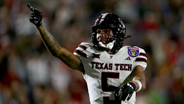 Dec 27, 2024; Memphis, TN, USA; Texas Tech Red Raiders wide receiver Caleb Douglas (5) reacts after a first down catch during the second quarter against the Arkansas Razorbacks at Simmons Bank Liberty Stadium. Mandatory Credit: Petre Thomas-Imagn Images