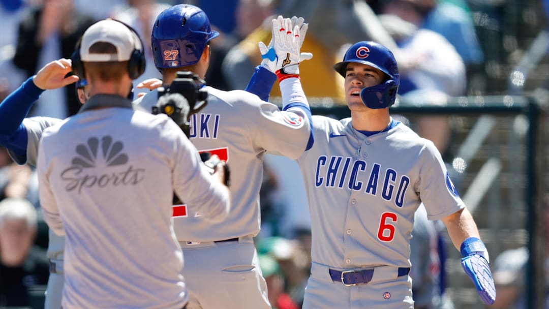 Apr 2, 2025; West Sacramento, California, USA; Chicago Cubs outfielder Seiya Suzuki (27) is congratulated by second base Matt Shaw (6) after hitting a three run home run during the second inning against the Athletics at Sutter Health Park
