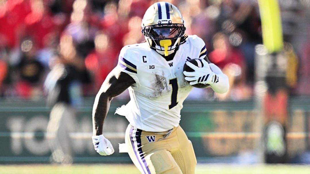 Oct 4, 2025; College Park, Maryland, USA;  Washington Huskies running back Jonah Coleman (1) carries the ball against the Maryland Terrapins at SECU Stadium.