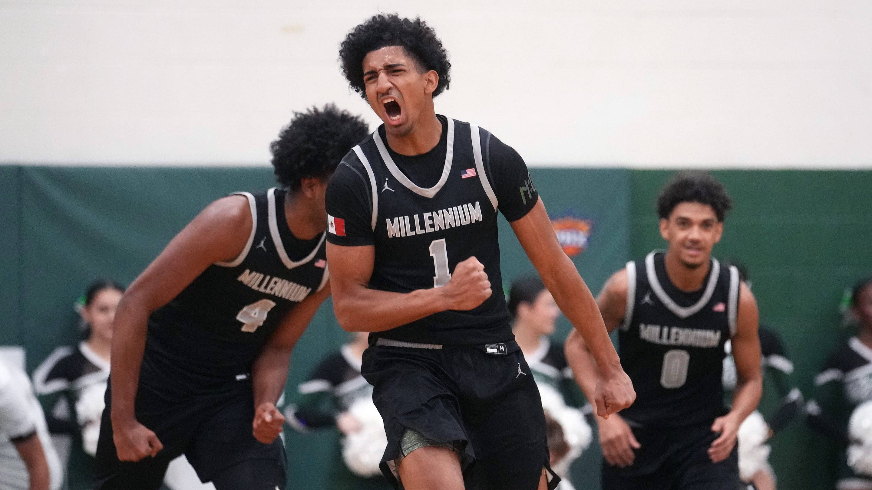 Millennium Tigers guard Adan Diggs (1) celebrates his dunk against the Sunnyslope Vikings during their game at Sunnyslope High School on Jan. 21, 2026. | USA TODAY Network via Reuters Connect