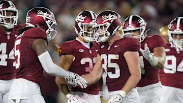 Sep 13, 2025; Stanford, California, USA; Stanford Cardinal linebacker Matt Rose (35) is congratulated by safety Jay Green (5) after a tackle against the Boston College Eagles during the third quarter at Stanford Stadium. Mandatory Credit: Darren Yamashita-Imagn Images