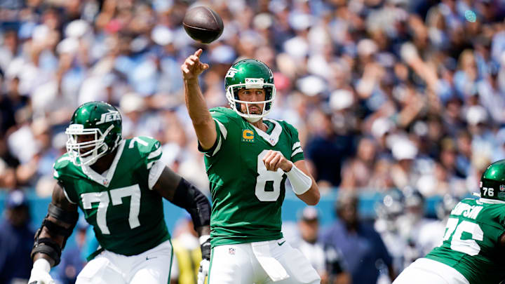 New York Jets quarterback Aaron Rodgers (8) throws against the Tennessee Titans during the first quarter at Nissan Stadium in Nashville, Tenn., Sunday, Sept. 15, 2024.