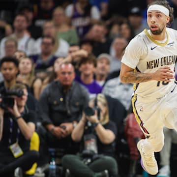 Feb 27, 2025; Phoenix, Arizona, USA; New Orleans Pelicans guard Jose Alvarado (15) dribbles against the Phoenix Suns in the second quarter at Footprint Center. Mandatory Credit: Brett Davis-Imagn Images