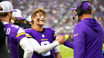 J.J. McCarthy and Kevin O'Connell during a 2024 preseason game at U.S. Bank Stadium.
