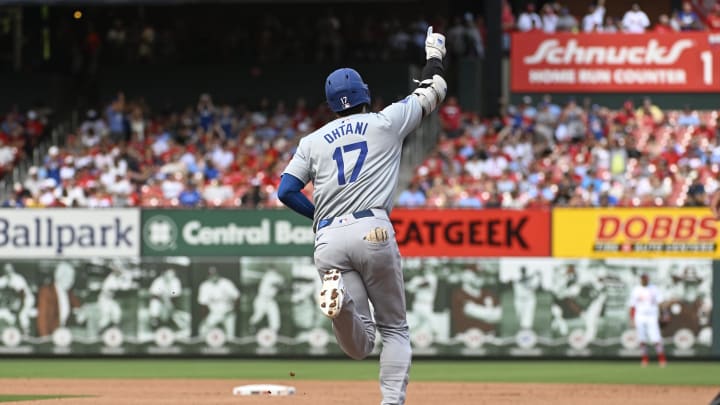 Aug 18, 2024; St. Louis, Missouri, USA; Los Angeles Dodgers designated hitter Shohei Ohtani (17) rounds the bases after hitting a solo home run against the St. Louis Cardinals in the fifth inning at Busch Stadium.