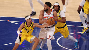 Indiana Pacers' Andrew Nembhard steals the ball against New York Knicks center Karl-Anthony Towns in the 2025 NBA Playoffs