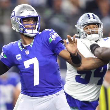Nov 30, 2023; Arlington, Texas, USA; Seattle Seahawks quarterback Geno Smith (7) throws to pass against the Dallas Cowboys during the second half at AT&T Stadium. Mandatory Credit: Tim Heitman-USA TODAY Sports