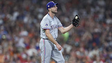 Jul 14, 2024; Houston, Texas, USA; Texas Rangers starting pitcher Max Scherzer (31) reacts after walking a batter during the fifth inning against the Houston Astros at Minute Maid Park. Mandatory Credit: Troy Taormina-Imagn Images