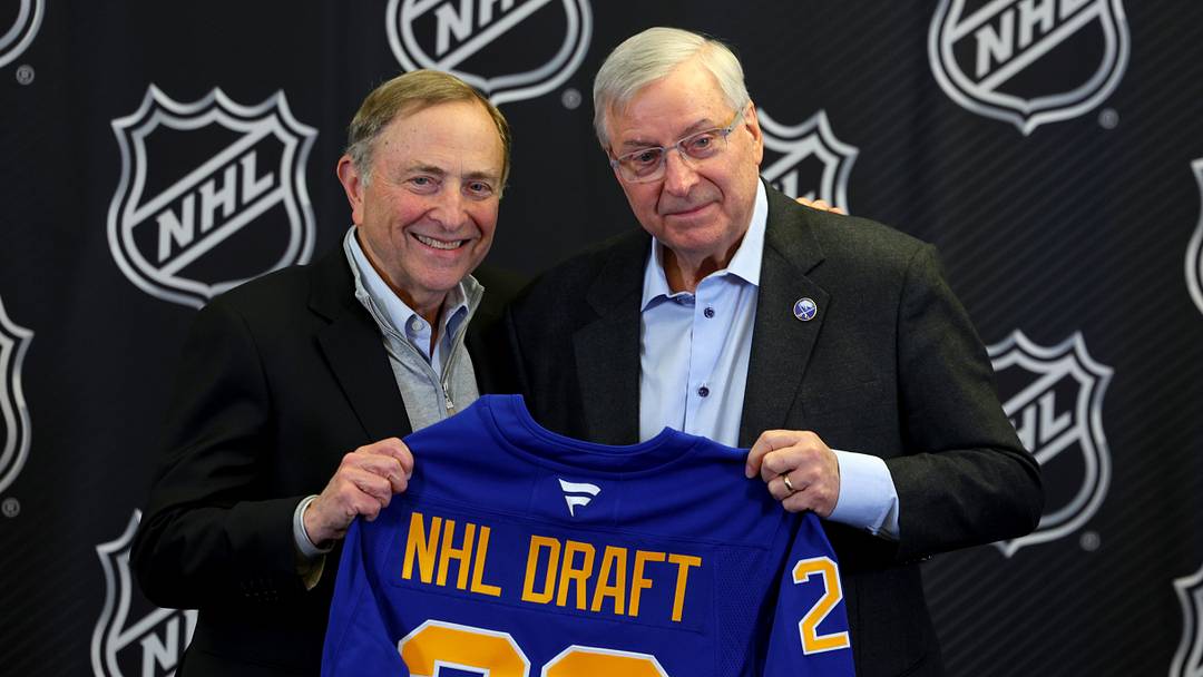 Jan 12, 2026; Buffalo, New York, USA;  NHL Commissioner Gary Bettman and Buffalo Sabres owner Terry Pegula pose for a photo during a press conference announcing the 2026 NHL Draft taking place in Buffalo at KeyBank Center. Mandatory Credit: Timothy T. Ludwig-Imagn Images