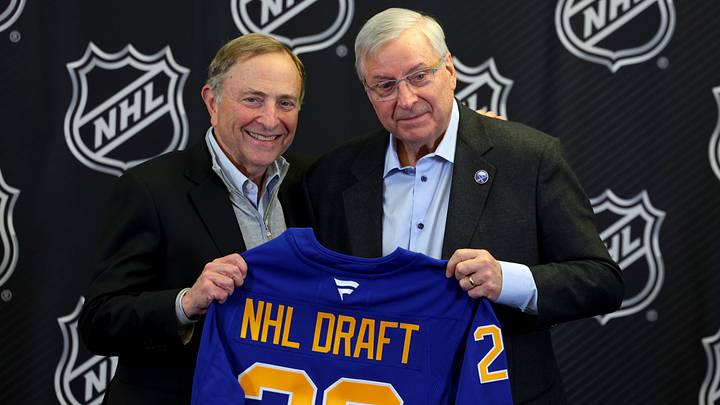 Jan 12, 2026; Buffalo, New York, USA;  NHL Commissioner Gary Bettman and Buffalo Sabres owner Terry Pegula pose for a photo during a press conference announcing the 2026 NHL Draft taking place in Buffalo at KeyBank Center. Mandatory Credit: Timothy T. Ludwig-Imagn Images