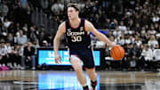 Mar 1, 2025; Providence, Rhode Island, USA; Connecticut Huskies forward Liam McNeeley (30) dribbles against the Providence Friars  during the second half at Amica Mutual Pavilion. Mandatory Credit: Eric Canha-Imagn Images