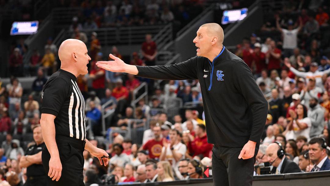 Mar 22, 2026; St. Louis, MO, USA; Kentucky Wildcats head coach Mark Pope speaks to the referee during the first half against the Iowa State Cyclones during a second round game of the men's 2026 NCAA Tournament at Enterprise Center. Mandatory Credit: Jeff Curry-Imagn Images