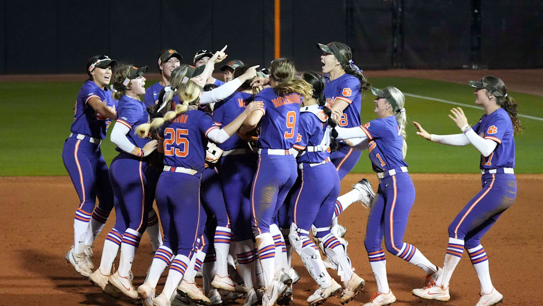 The Clemson softball team celebrates winning a NCAA softball game against Tennessee in extra innings at Sherri Parker Lee Stadium in Knoxville, Tenn., on April 22, 2025.
