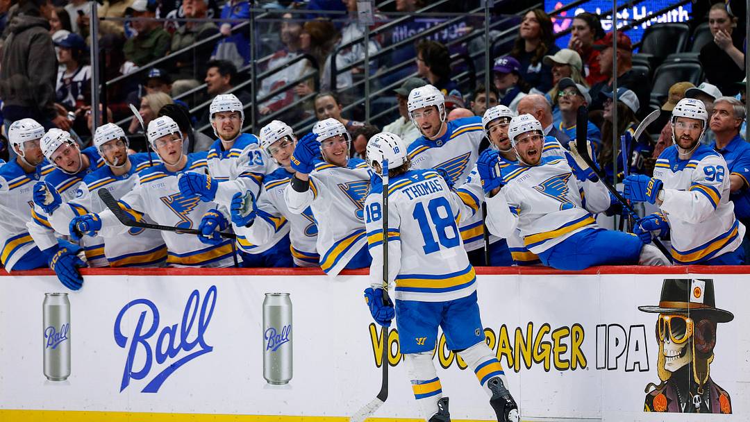 Apr 5, 2026; Denver, Colorado, USA; St. Louis Blues center Robert Thomas (18) celebrates with the bench after his hat trick goal against the Colorado Avalanche in the third period at Ball Arena. Mandatory Credit: Isaiah J. Downing-Imagn Images