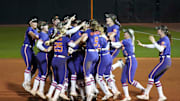 The Clemson softball team celebrates winning a NCAA softball game against Tennessee in extra innings at Sherri Parker Lee Stadium in Knoxville, Tenn., on April 22, 2025.