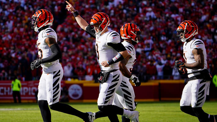 Cincinnati Bengals quarterback Joe Burrow (9) gestures as he takes the field for an offensive possession with Cincinnati Bengals wide receiver Tee Higgins (85) and Cincinnati Bengals wide receiver Ja'Marr Chase (1) in the first quarter during the AFC championship NFL football game against the Kansas City Chiefs, Sunday, Jan. 30, 2022, at GEHA Field at Arrowhead Stadium in Kansas City, Mo.

Cincinnati Bengals At Kansas City Chiefs Jan 30 Afc Championship 358