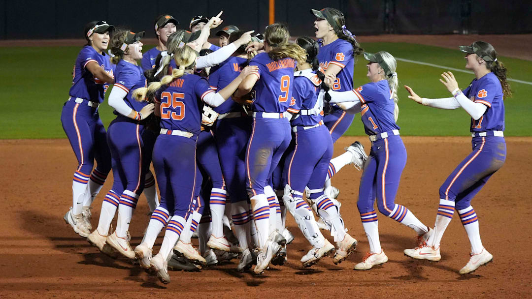 The Clemson softball team celebrates winning a NCAA softball game against Tennessee in extra innings at Sherri Parker Lee Stadium in Knoxville, Tenn., on April 22, 2025.