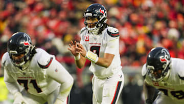 Jan 18, 2025; Kansas City, Missouri, USA; Houston Texans quarterback C.J. Stroud (7) gets ready before the snap during the second half against the Kansas City Chiefs in a 2025 AFC divisional round game at GEHA Field at Arrowhead Stadium. Mandatory Credit: Jay Biggerstaff-Imagn Images
