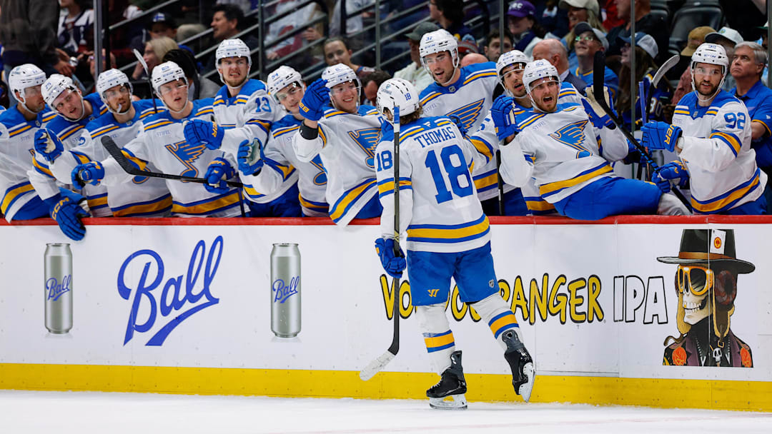 Apr 5, 2026; Denver, Colorado, USA; St. Louis Blues center Robert Thomas (18) celebrates with the bench after his hat trick goal against the Colorado Avalanche in the third period at Ball Arena. Mandatory Credit: Isaiah J. Downing-Imagn Images
