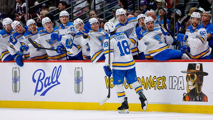 Apr 5, 2026; Denver, Colorado, USA; St. Louis Blues center Robert Thomas (18) celebrates with the bench after his hat trick goal against the Colorado Avalanche in the third period at Ball Arena. Mandatory Credit: Isaiah J. Downing-Imagn Images