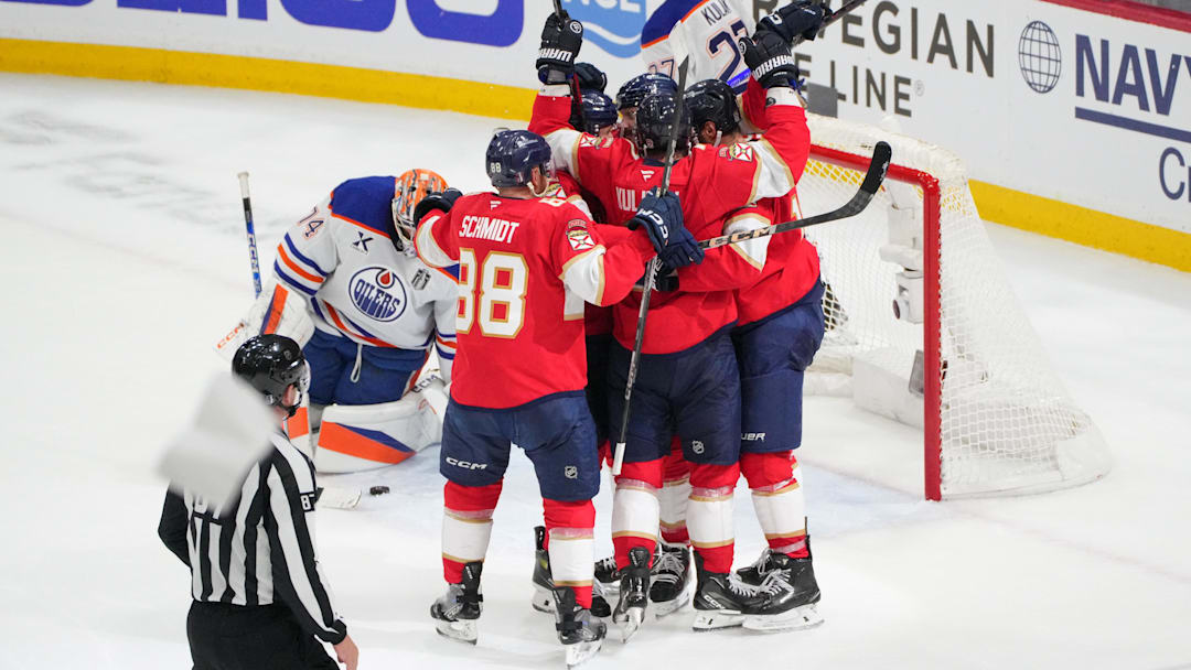 Jun 17, 2025; Sunrise, Florida, USA; Florida Panthers center Sam Reinhart (13) celebrates after his goal as Edmonton Oilers goaltender Stuart Skinner (74) watches during the second period in game six of the 2025 Stanley Cup Final at Amerant Bank Arena. Mandatory Credit: Jim Rassol-Imagn Images