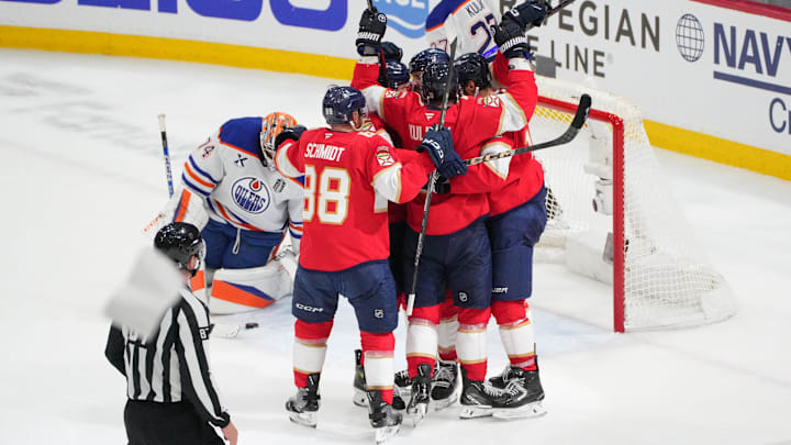 Jun 17, 2025; Sunrise, Florida, USA; Florida Panthers center Sam Reinhart (13) celebrates after his goal as Edmonton Oilers goaltender Stuart Skinner (74) watches during the second period in game six of the 2025 Stanley Cup Final at Amerant Bank Arena. Mandatory Credit: Jim Rassol-Imagn Images