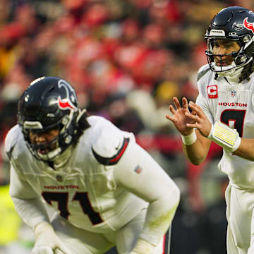 Jan 18, 2025; Kansas City, Missouri, USA; Houston Texans quarterback C.J. Stroud (7) gets ready before the snap during the second half against the Kansas City Chiefs in a 2025 AFC divisional round game at GEHA Field at Arrowhead Stadium. Mandatory Credit: Jay Biggerstaff-Imagn Images