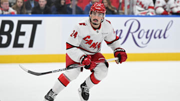 Feb 22, 2025; Toronto, Ontario, CAN;  Carolina Hurricanes forward Seth Jarvis (24) pursues the play against the Toronto Maple Leafs in the second period at Scotiabank Arena. Mandatory Credit: Dan Hamilton-Imagn Images