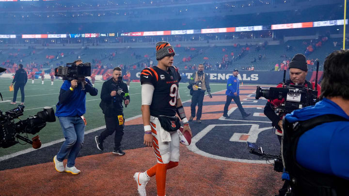 Cincinnati Bengals quarterback Joe Burrow (9) walks to the locker room surrounded by cameras after the fourth quarter of the NFL Week 9 game between the Cincinnati Bengals and the Buffalo Bills at Paycor Stadium in Cincinnati on Sunday, Nov. 5, 2023.