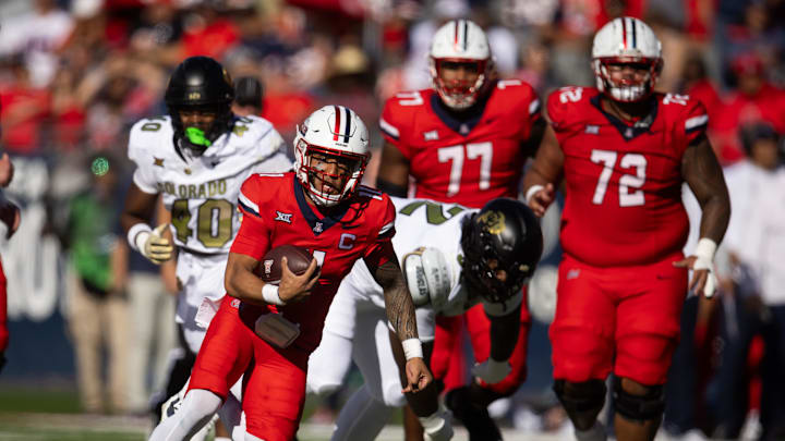 Oct 19, 2024; Tucson, Arizona, USA; Arizona Wildcats quarterback Noah Fifita (11) against the Colorado Buffalos at Arizona Stadium. Mandatory Credit: Mark J. Rebilas-Imagn Images