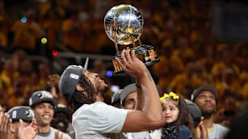 May 31, 2025; Indianapolis, Indiana, USA; Indiana Pacers center Myles Turner (33) raises the trophy after game six of the eastern conference finals against the New York Knicks for the 2025 NBA Playoffs at Gainbridge Fieldhouse. Mandatory Credit: Trevor Ruszkowski-Imagn Images