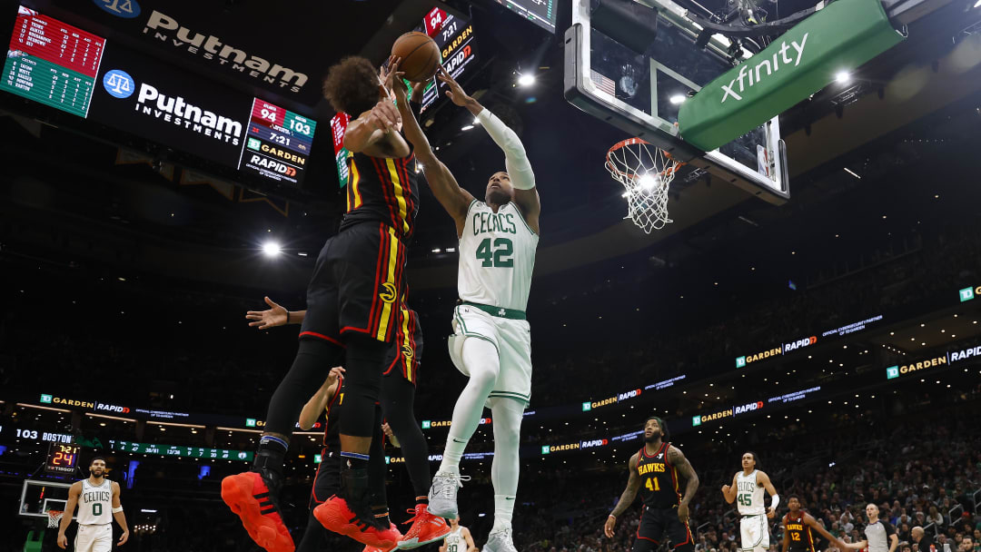 Nov 26, 2023; Boston, Massachusetts, USA; Boston Celtics center Al Horford (42) goes up to grab a