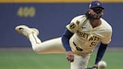 Oct 14, 2025; Milwaukee, Wisconsin, USA; Milwaukee Brewers pitcher Freddy Peralta (51) throws pitch against the Los Angeles Dodgers in the first inning during game two of the NLCS round for the 2025 MLB playoffs at American Family Field. Mandatory Credit: Michael McLoone-Imagn Images